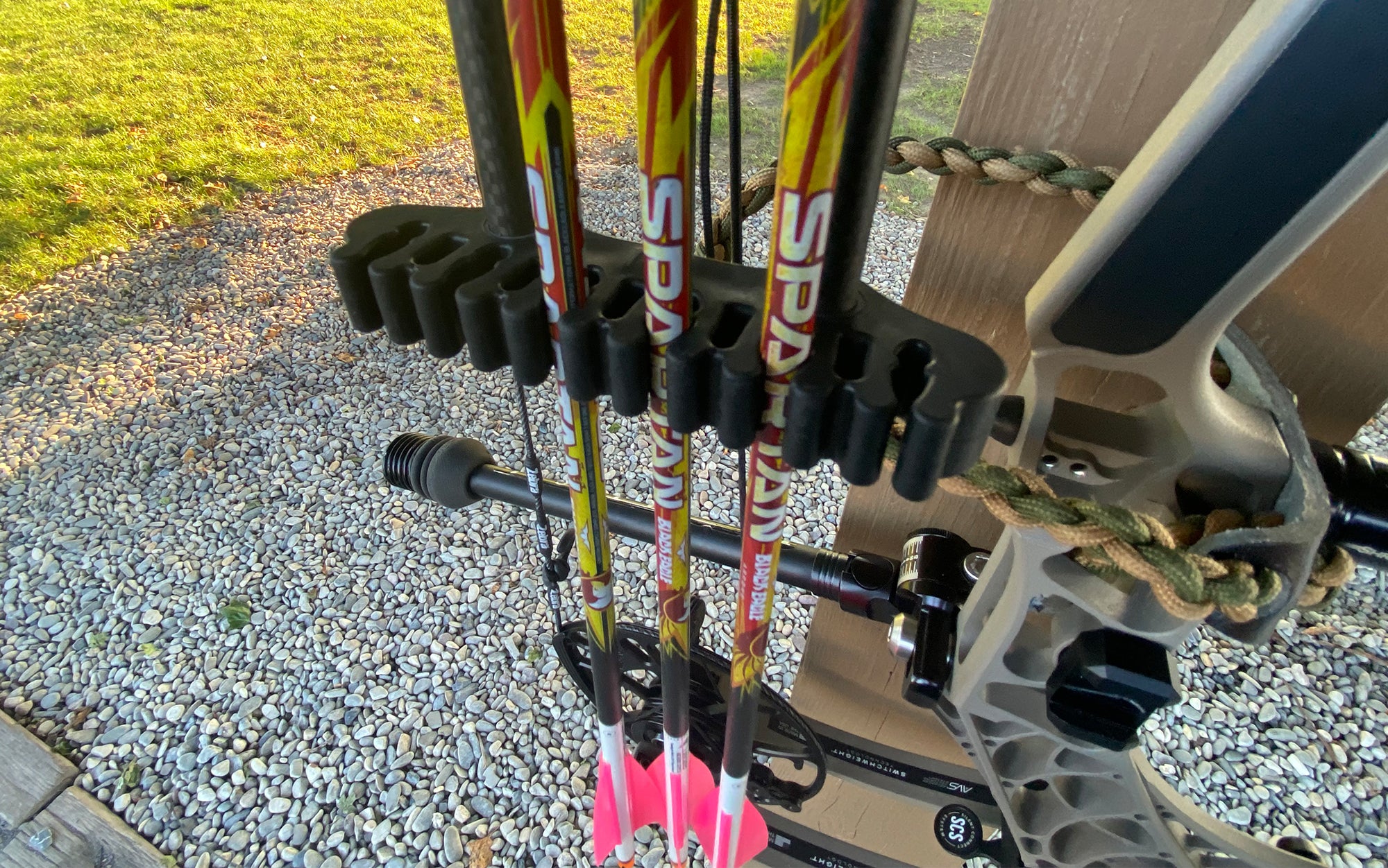 The Redline RL-1 secures arrows with a gripper in the lower third.